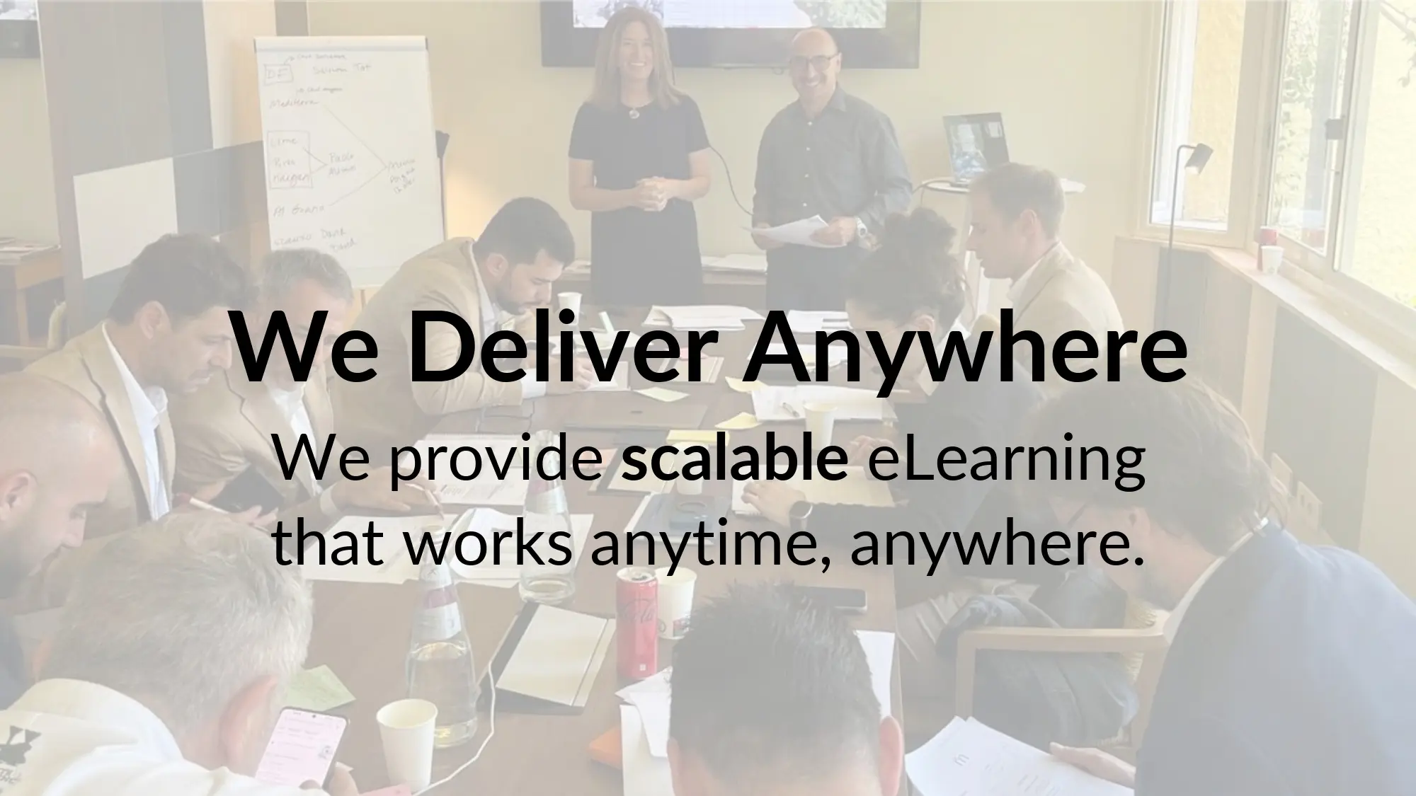 People in a meeting, text overlay present.