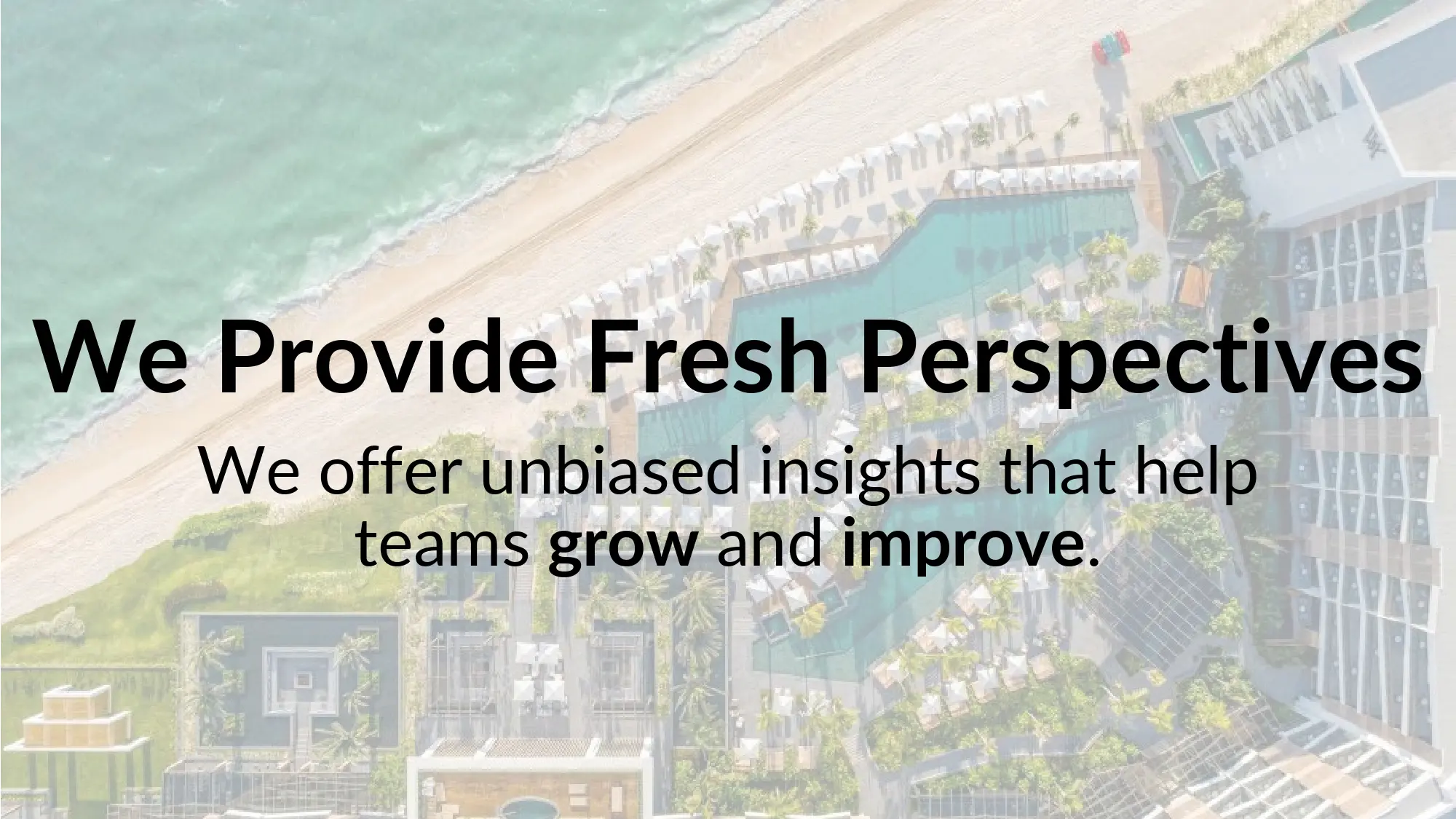 Text over aerial view of beach resort.