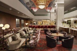 Luxurious hotel lobby with elegant seating area.