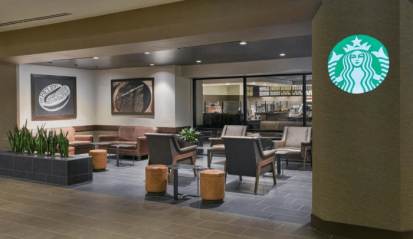 Modern coffee shop interior with seating area.